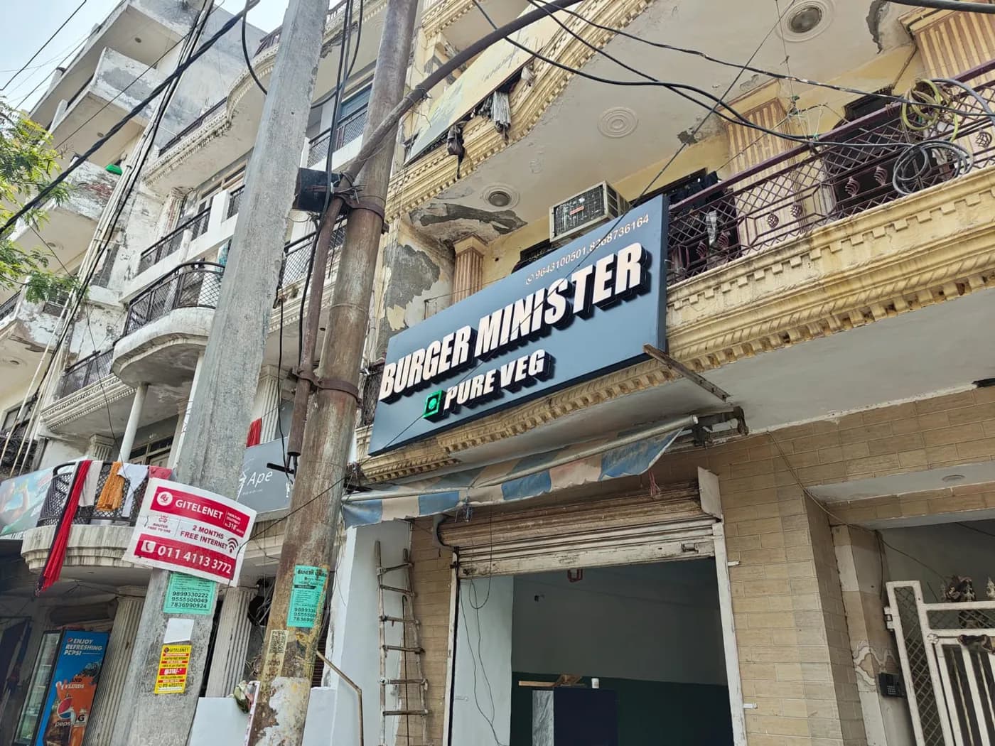 Burger Minister storefront and signboard at D13 Bhaiji Market, Sector 58 Noida